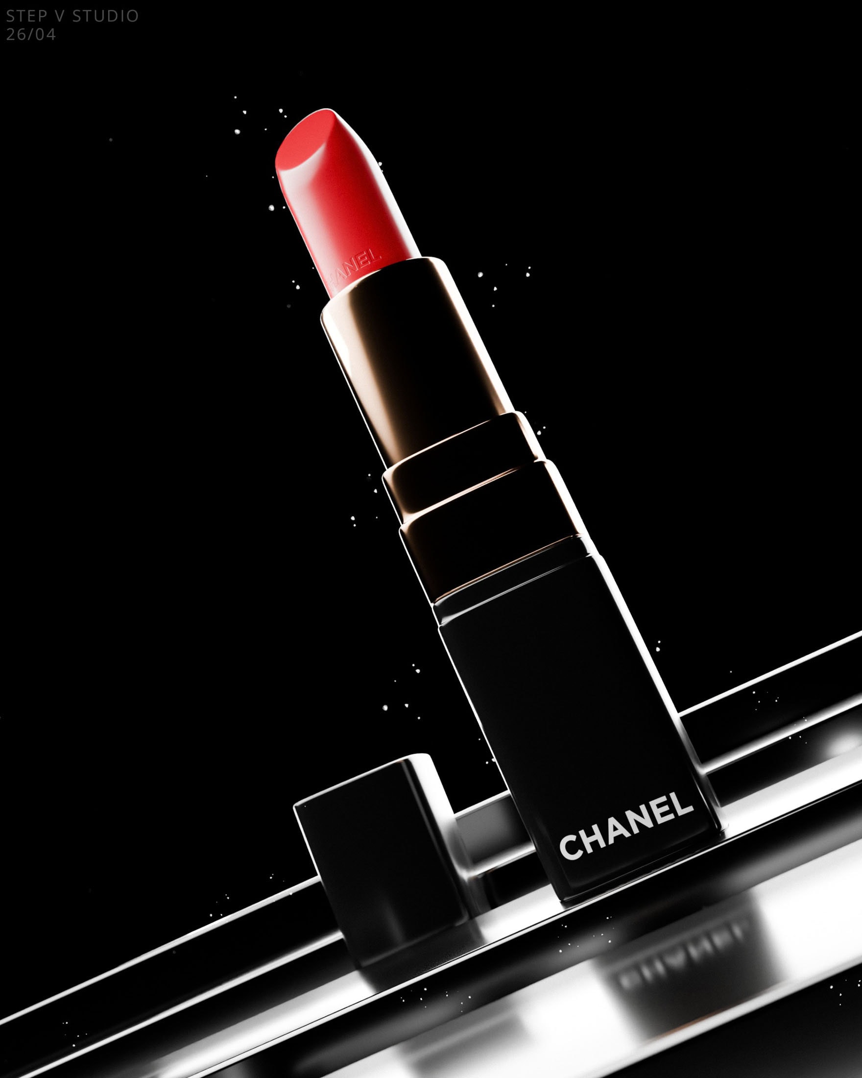 Close-up of a Chanel lipstick in a sleek black and gold tube against a black background, emphasizing high-end beauty and cosmetics.