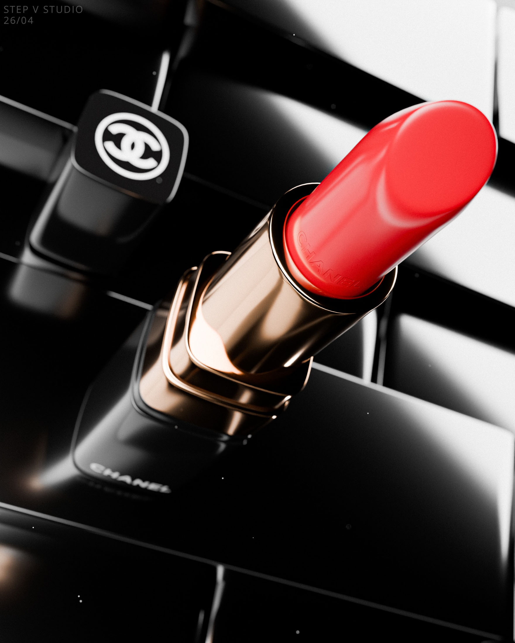 Close-up of a bold red lipstick with a sleek gold case on a black makeup palette, emphasizing beauty and elegance.