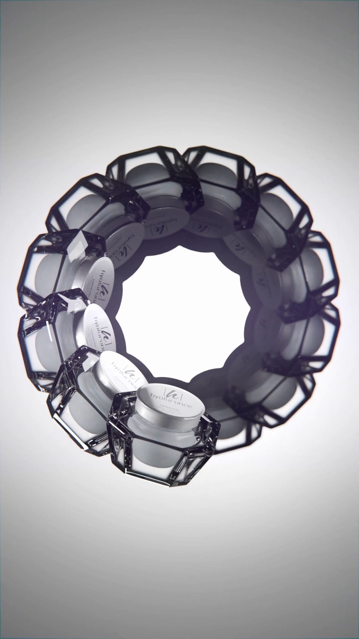 Luxurious rings arranged in a circular pattern on a reflective surface.